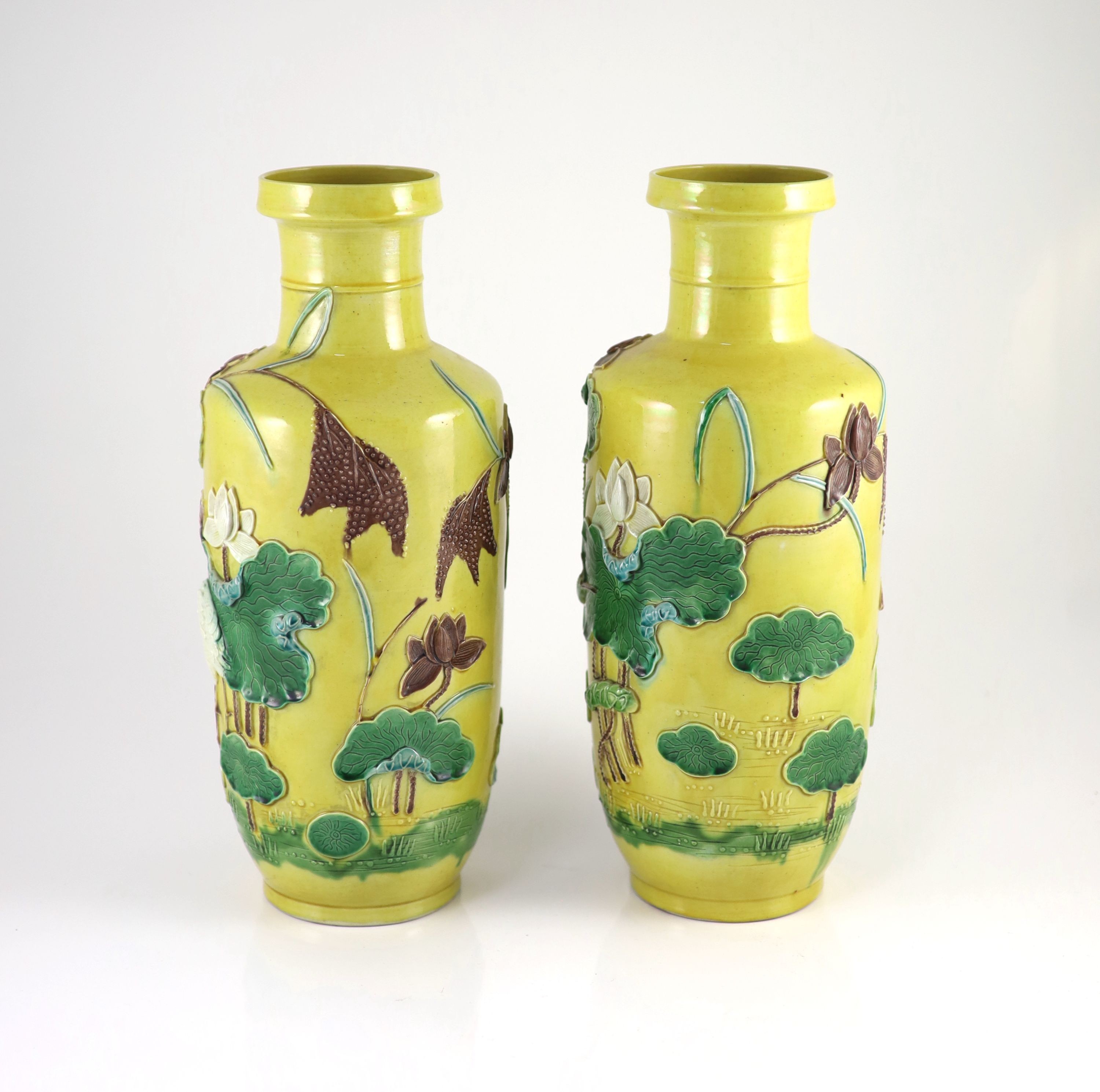 A pair of Chinese yellow ground ‘crane and lotus’ rouleau vases, Qianlong seal mark, early 20th century 34.5 cm high